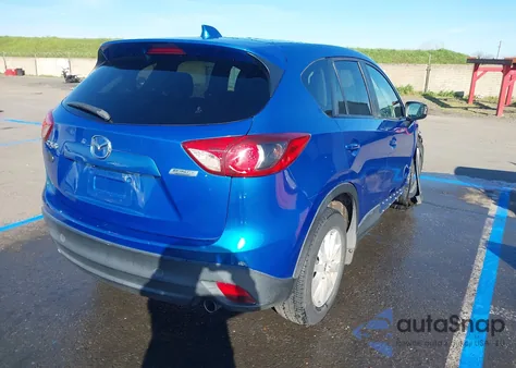 2013 Mazda Cx-5 Touring z USA, uszkodzony, nr VIN JM3KE2CE7D0165697